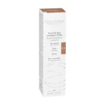 Fond de teint correcteur fluide